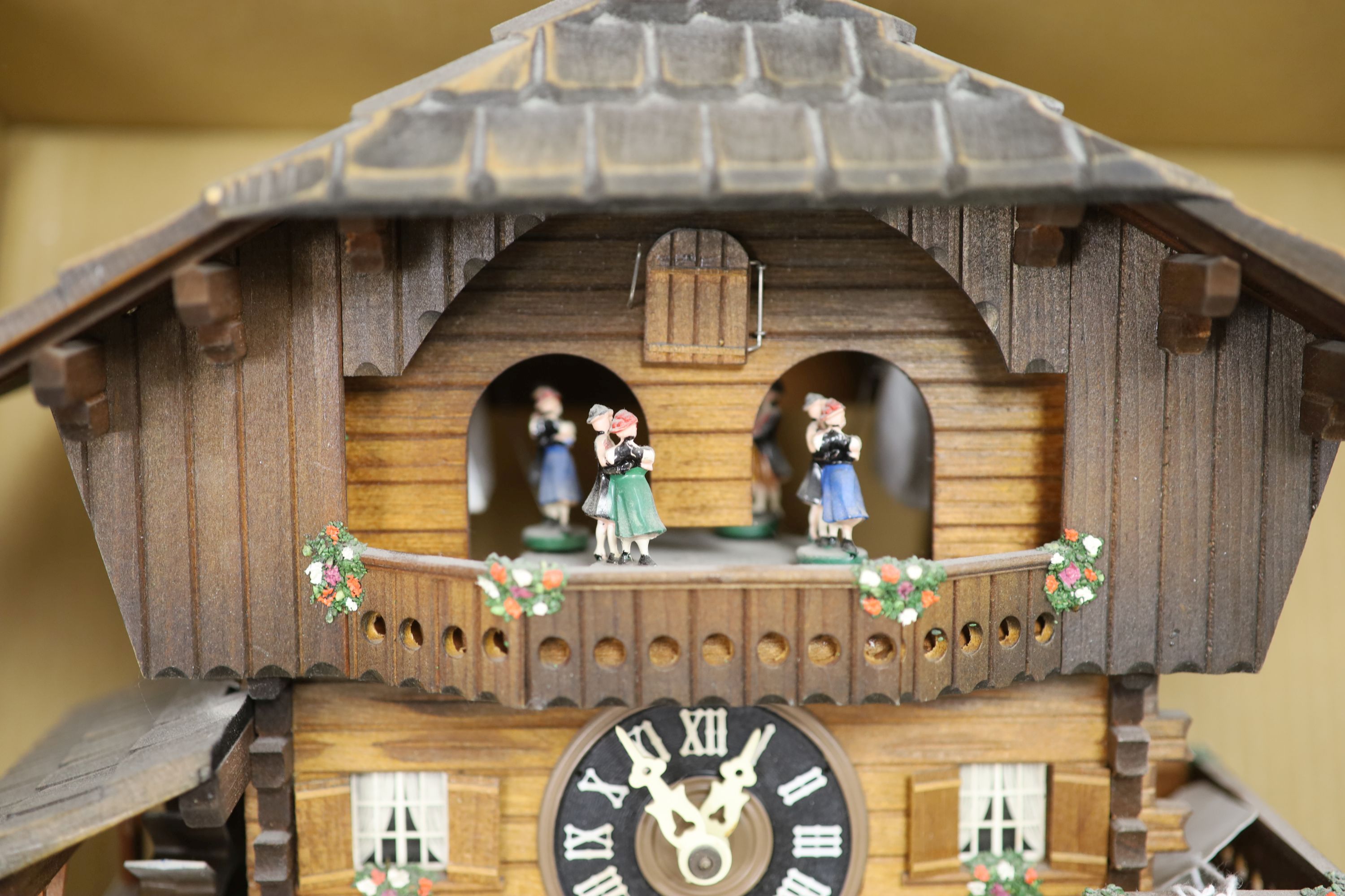A modern Black Forest wall clock, height 32cm excluding pendulum